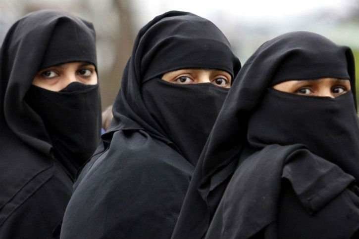 Mujeres con niqab.