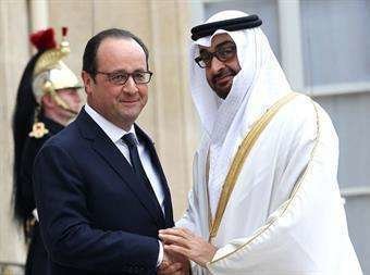 El presidente francés junto al príncipe heredero de Abu Dhabi.
