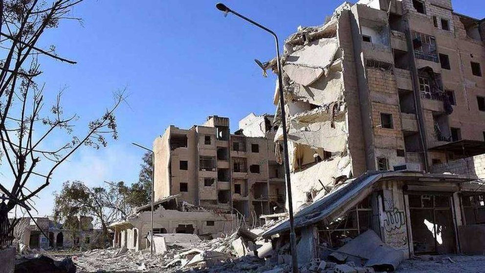 Imagen facilitada por la agencia oficial siria SANA de edificios dañados. (EFE)